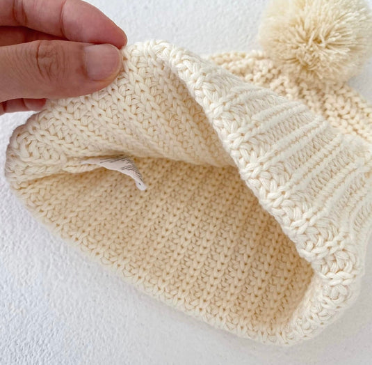 Ivory knit baby hat with soft cotton pom pom – Kali