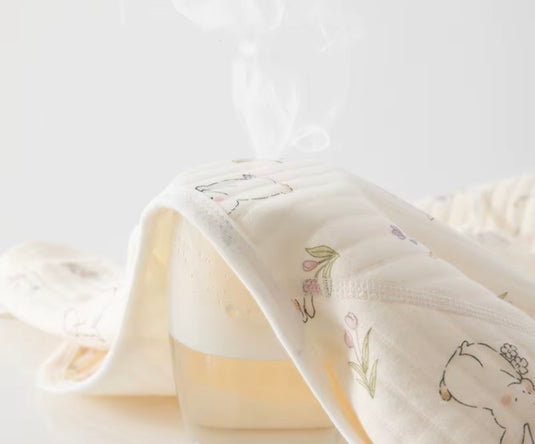 Combinaisone bébé à motifs lapins et fleurs – Ivoire et baleines 🤍 - Pré-commande