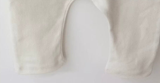 Combinaison en coton biologique bébé garçon – Ivoire